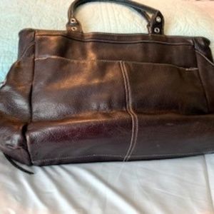 Tigbag Leather dark brown handbag.